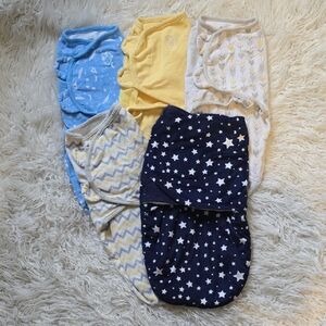 4 SwaddleMe Swaddles And 1 Other